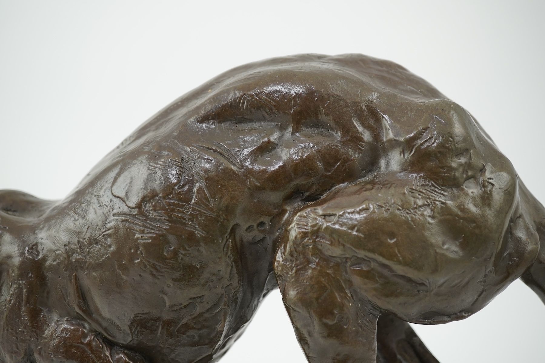 Manner of Mark Coreth (b. 1958): A patinated bronze model of a cheetah in full flight